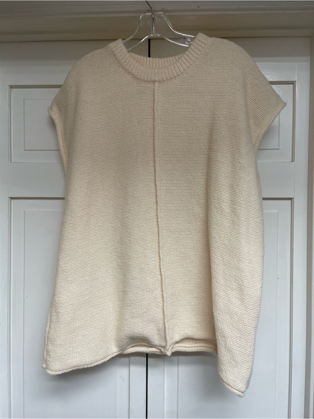 Women's Cream Knit Short-Sleeve Sweater Top. Basically sleeveless with tiny roll